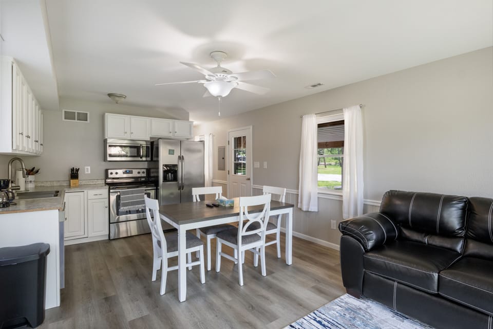 Open concept space from the kitchen to the dining and living areas.