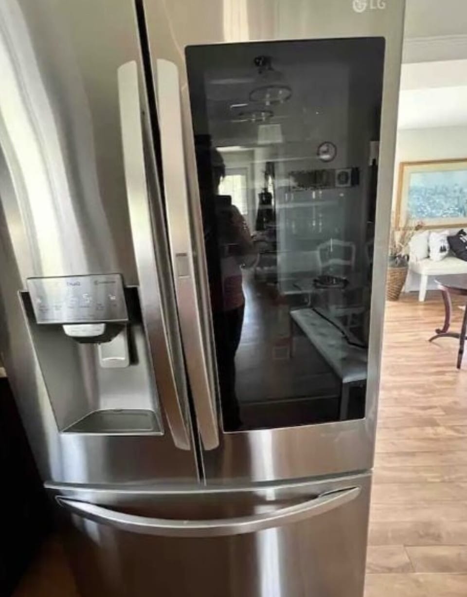 A new fridge with an ice machine and a good size freezer