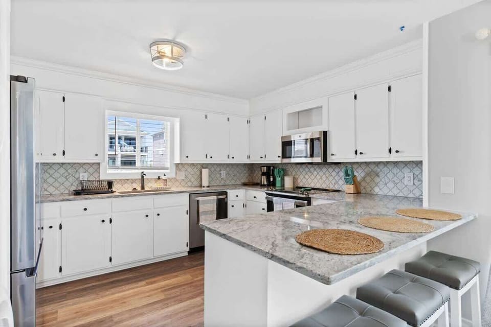 Modern design with sleek countertops, perfect for culinary adventures!