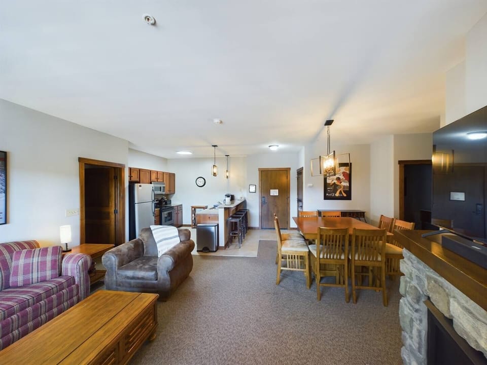 Living area from deck. Queen size sleeper sofa in living area.