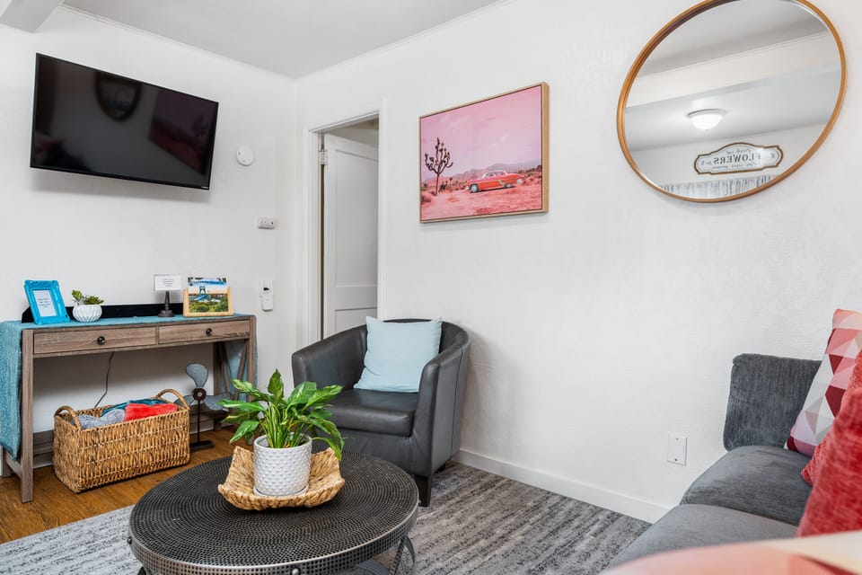 Happy vibes. Seating plus TV with sound bar.