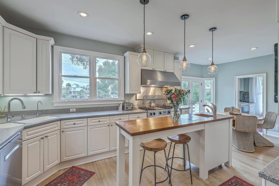 A sleek, fully equipped kitchen with updated appliances and plenty of space to cook and gather.