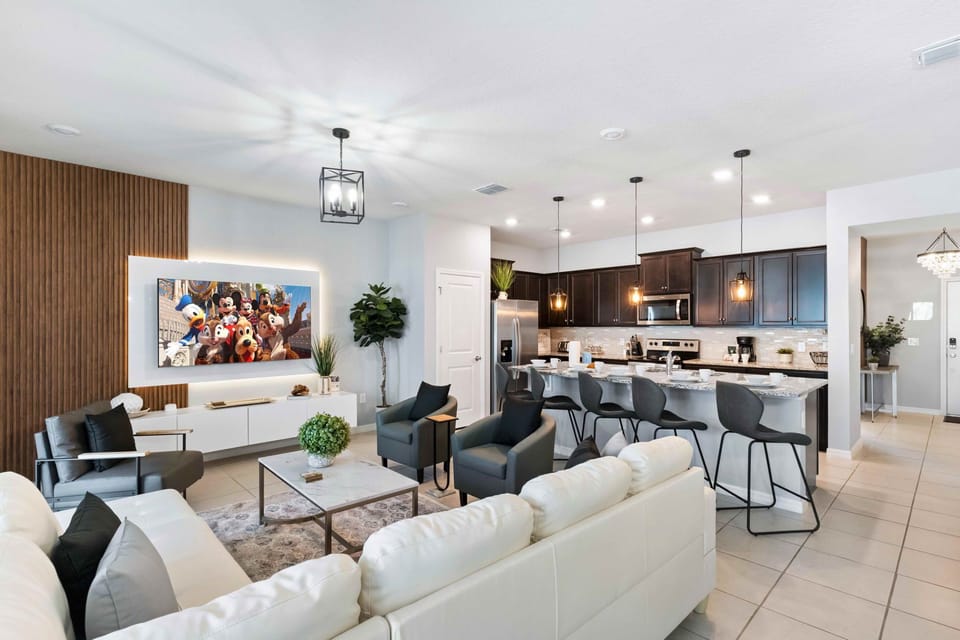 The living area, equipped with a smart TV, transforms into an entertainment haven. A cozy retreat where cinematic adventures and favorite shows come to life, promising endless hours of relaxation and enjoyment.