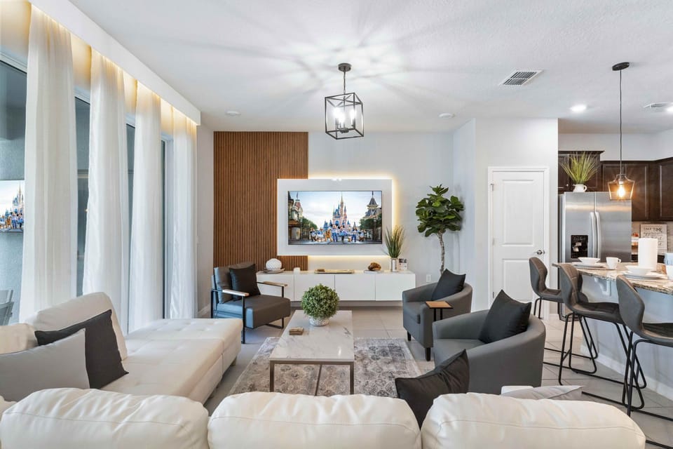 Living area - A space where favorite shows and movies come to life, inviting you to unwind and immerse yourself in cinematic bliss.