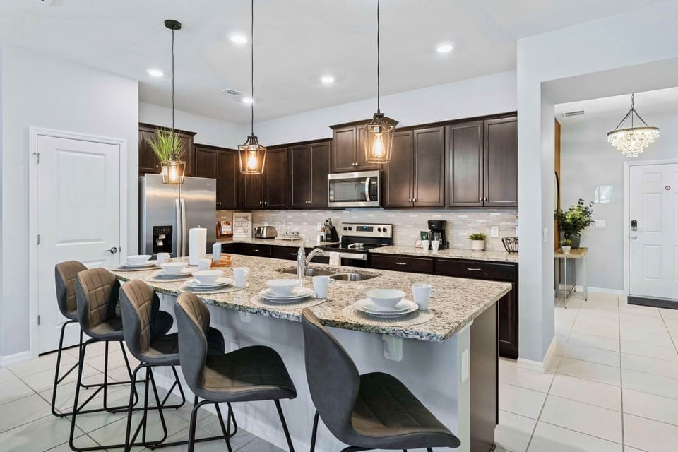 This fully equipped kitchen is a chef's dream, boasting modern appliances and ample space for culinary creations, where every meal becomes a masterpiece and every moment a delight.