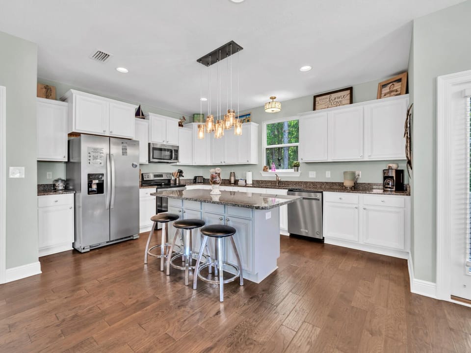 Beautifully open kitchen makes meals a part of the family experience!