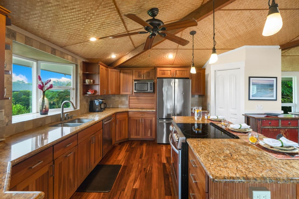 Kitchen, living room, dining room are all located upstairs
