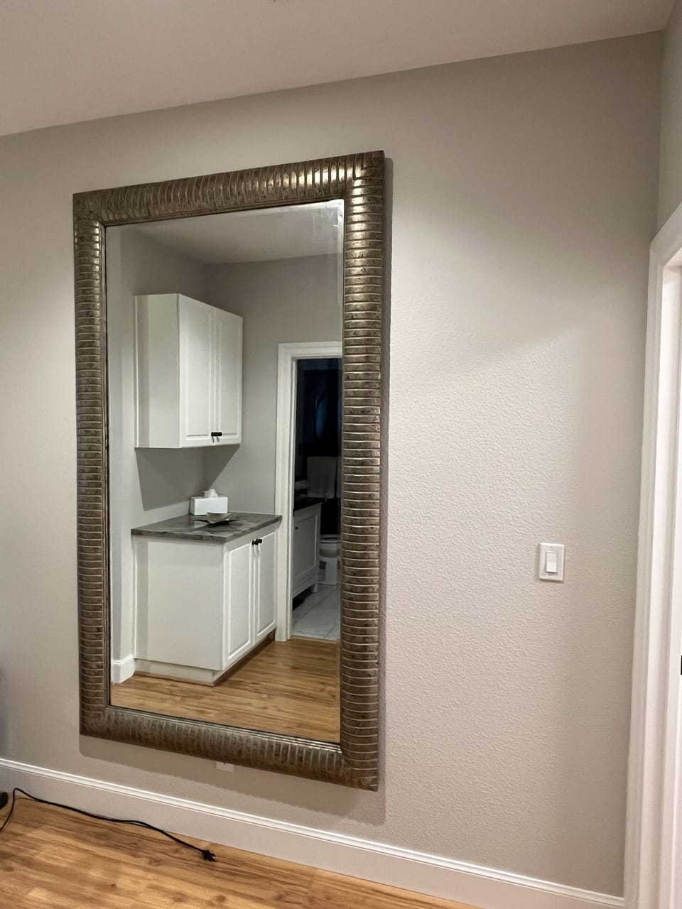 Full size mirror in hallway