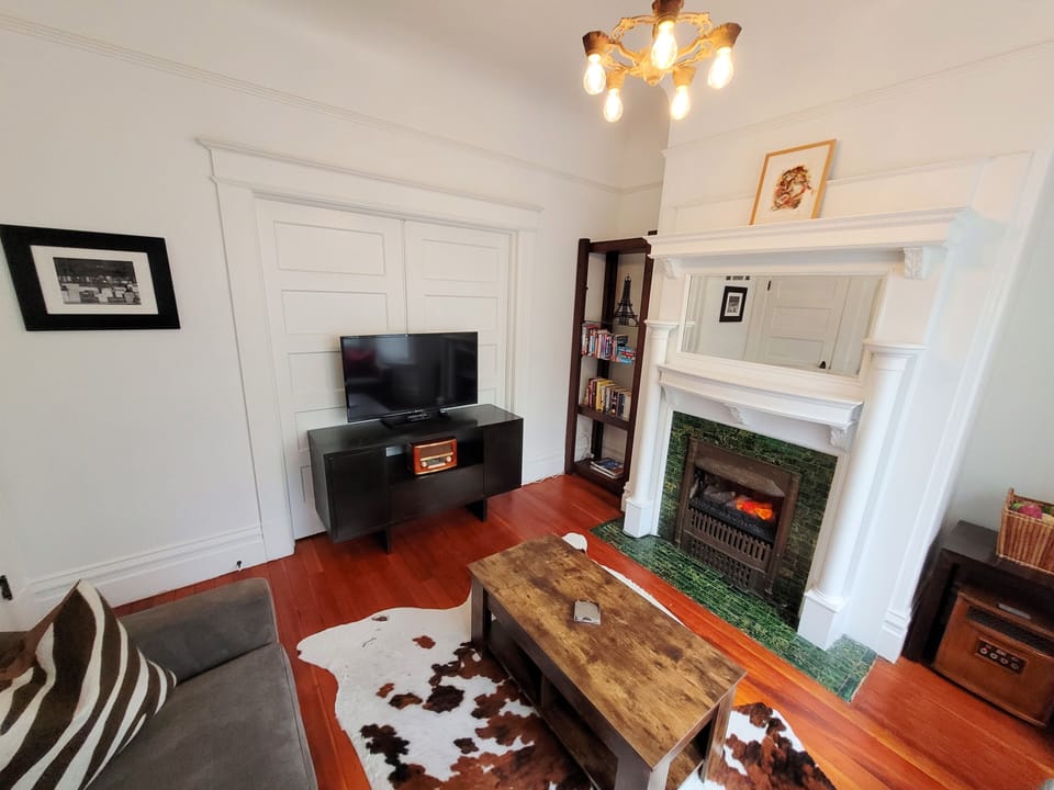 Equipped with a 40" ROKU TV, Bluetooth speaker & cozy radiant fireplace heater