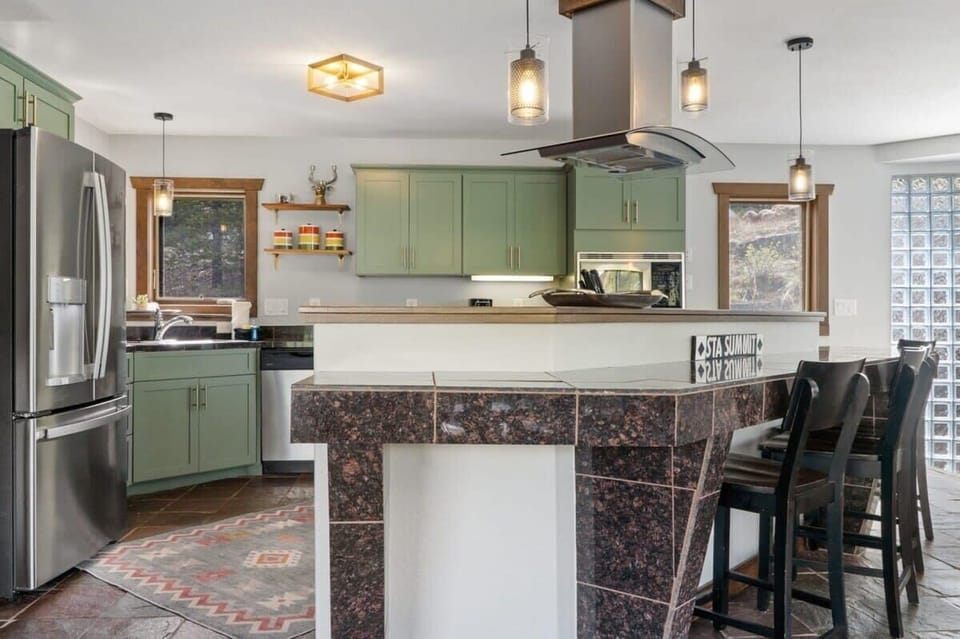 The open layout of the kitchen and its ample counter space make it a great kitchen to enjoy preparing meals with your loved ones.