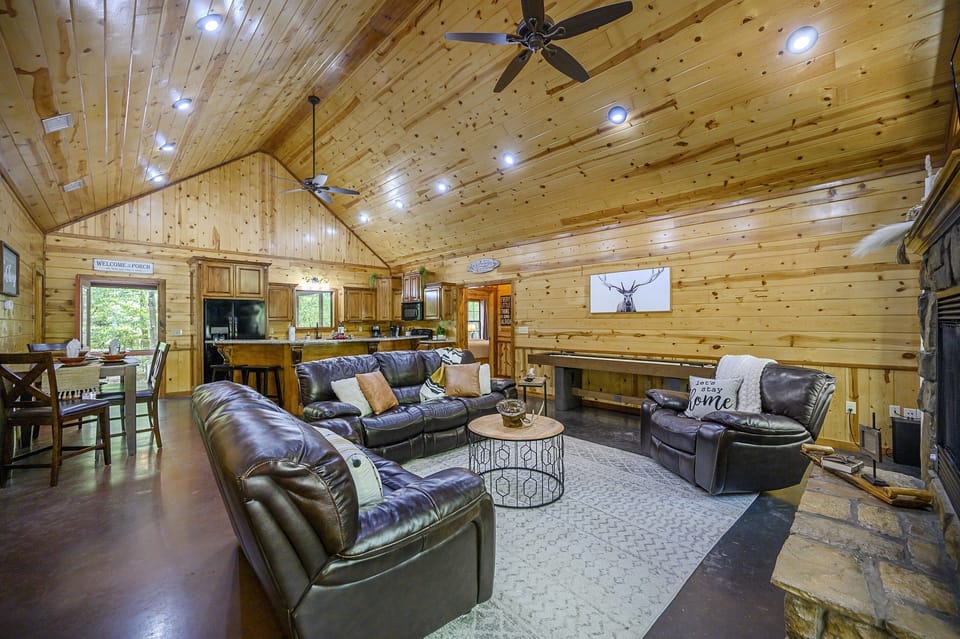 Living room has smart tv, sound bar, and subwoofer to enjoy music and moviesw.