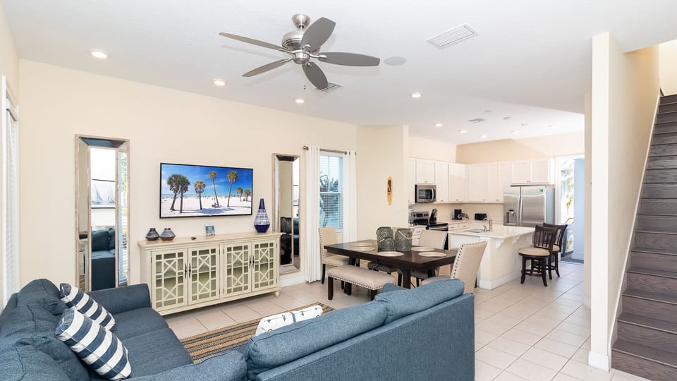 Spacious, stylish & open living area made for gathering in home base near Disney