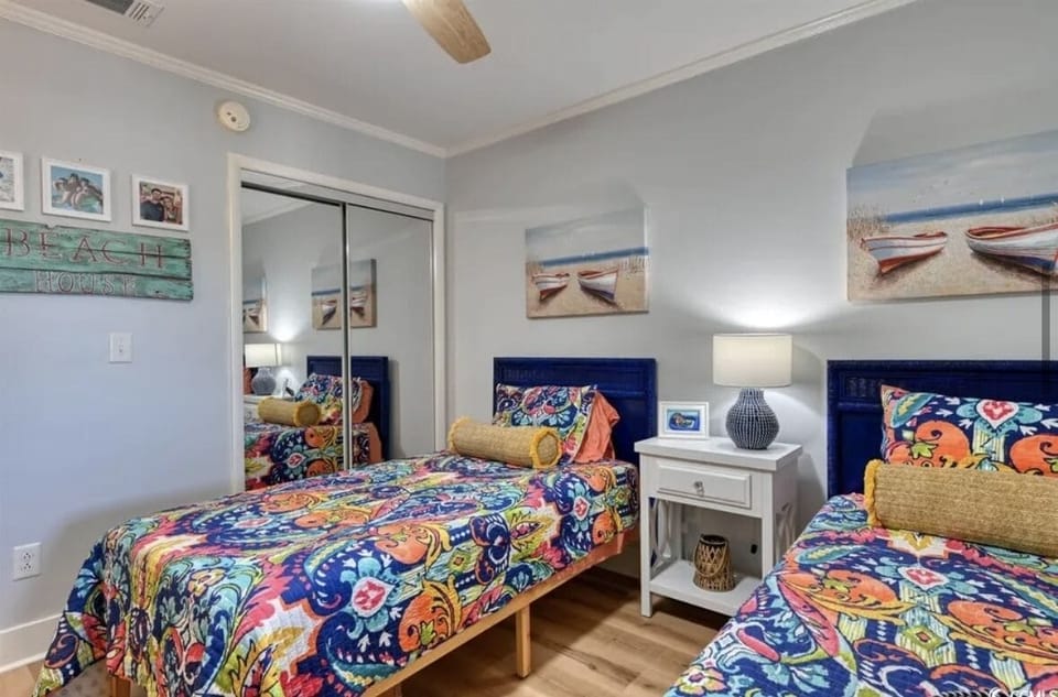 bedroom 3: large closet with portable crib and umbrella stroller