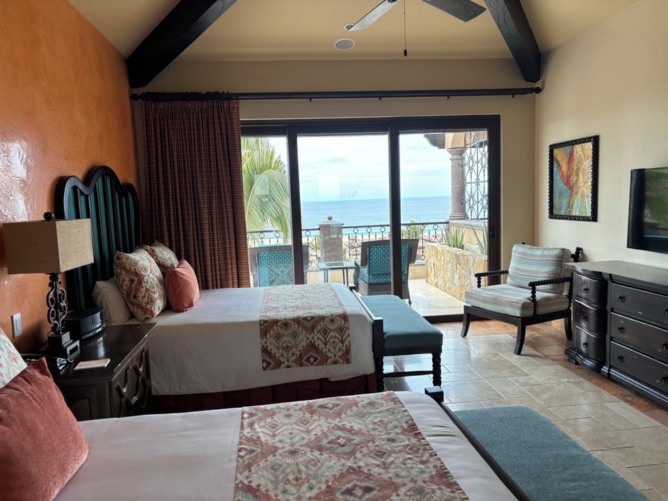 Two full size beds or One king available in Jr. Suite. 