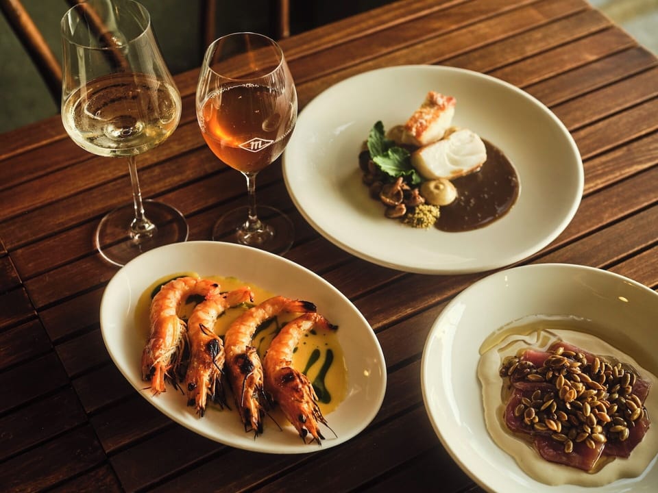 A delicious spread of fine food and wine—perfect for a relaxing meal with good company.