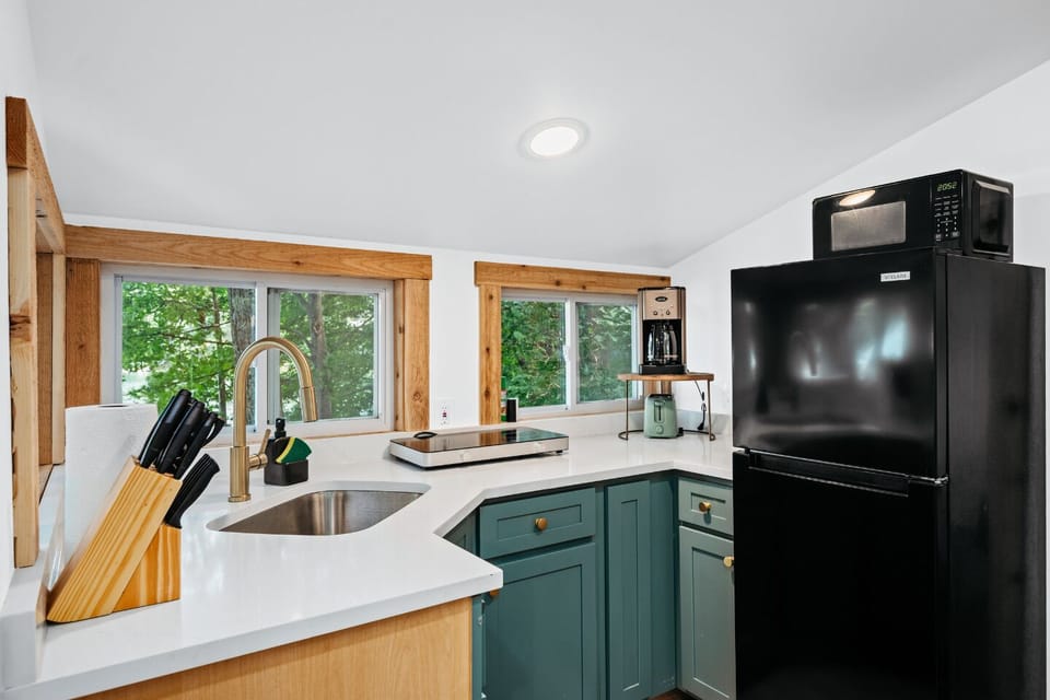 Kitchen: Bright and stylish with modern appliances and scenic views for your culinary adventures!