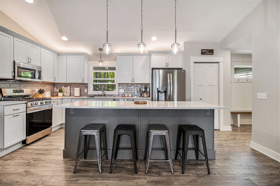 Island seating with up to 6 bar stools available.