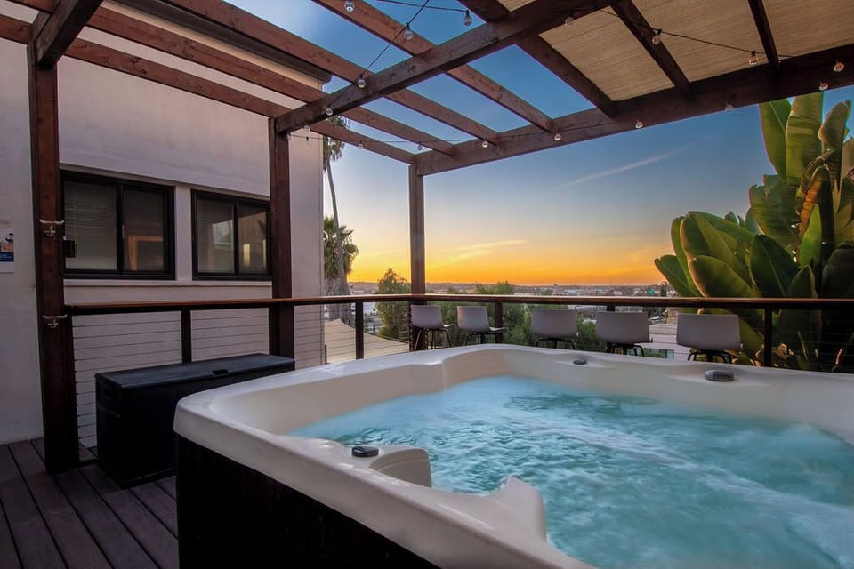 Panoramic views, outdoor seating, and a hot tub that overlooks it all. This is where mornings start slow and evenings wind down.