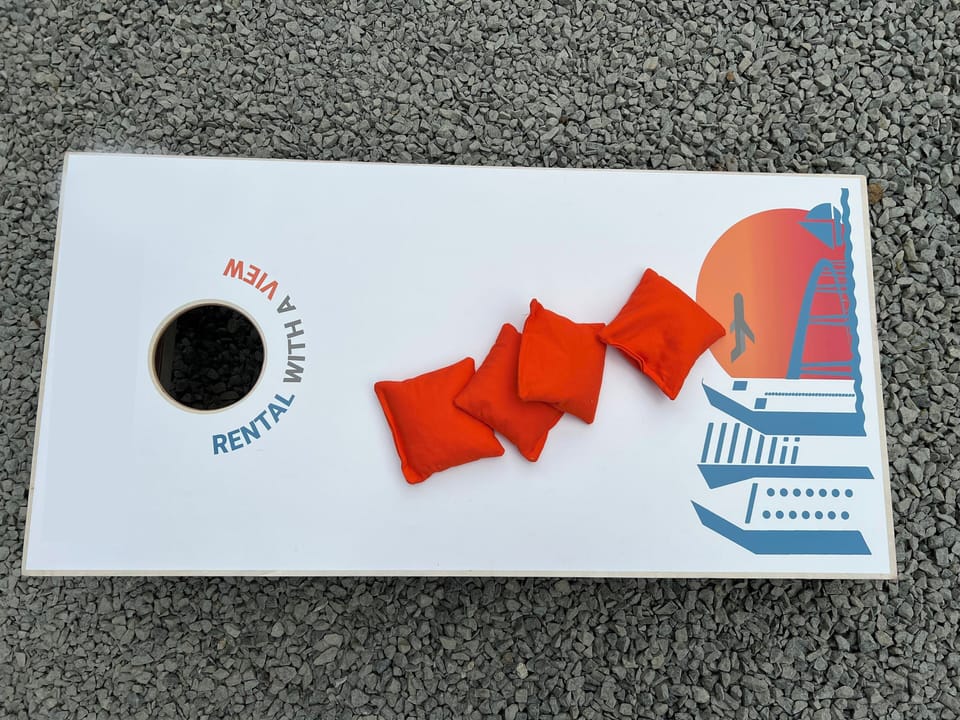 Enjoy a game of cornhole.