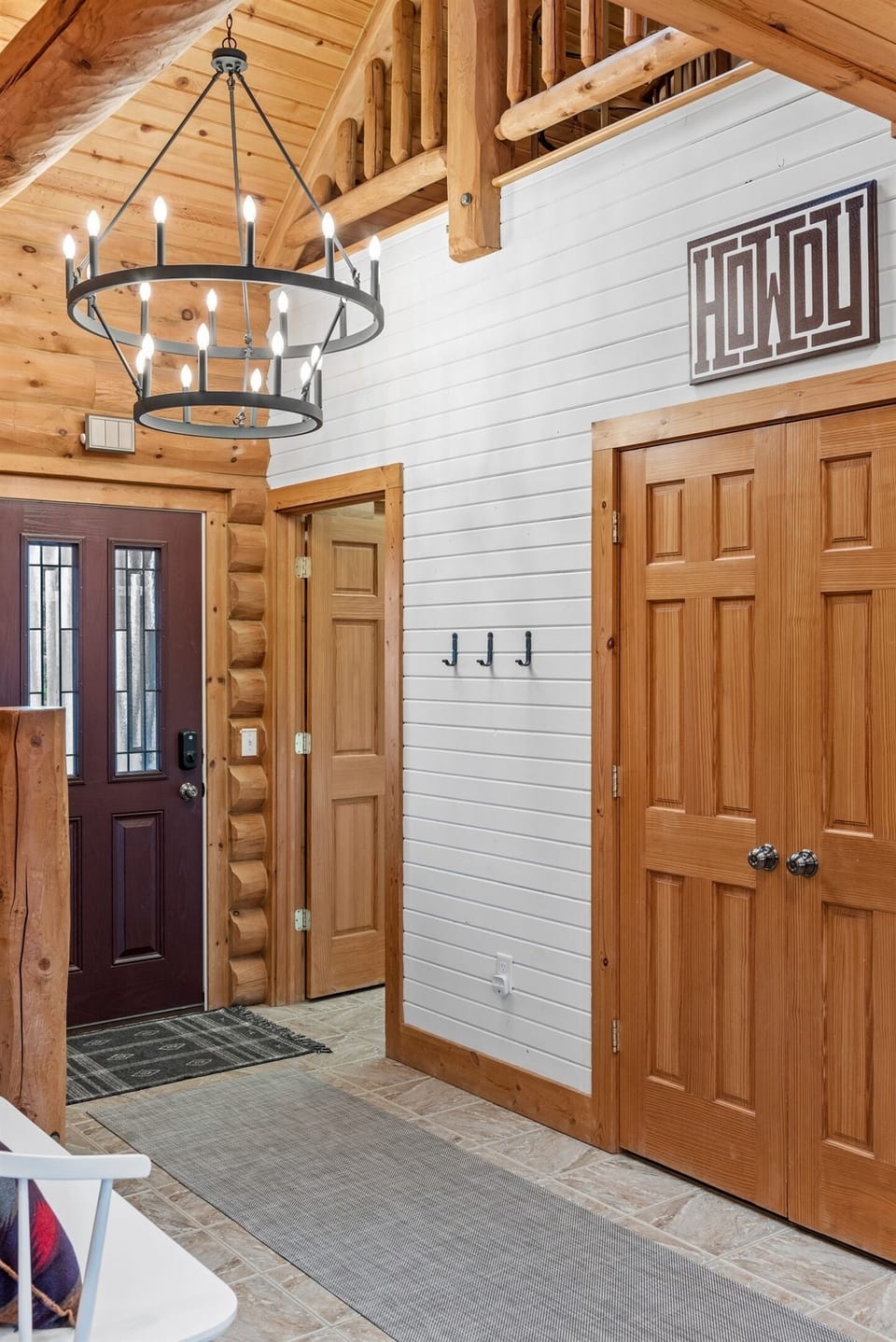 Vaulted ceilings & statement lighting create an airy, lodge-style feel.