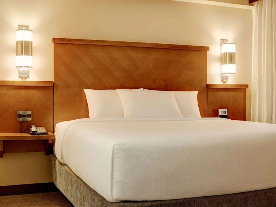 Sink into crisp linens and enjoy a calm, quiet night.
