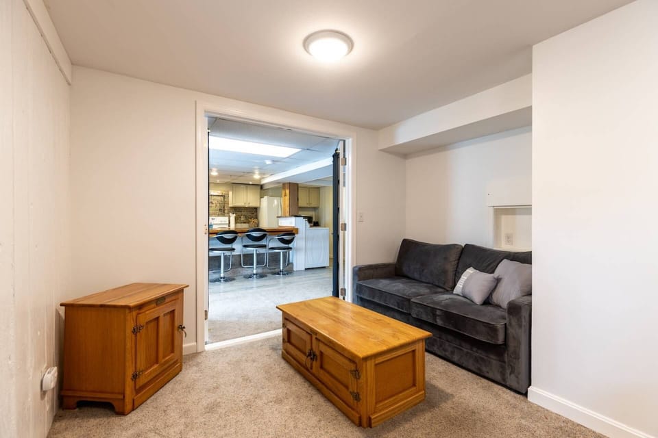 There is room for 2 more on the full-size sleeper sofa in the family room.