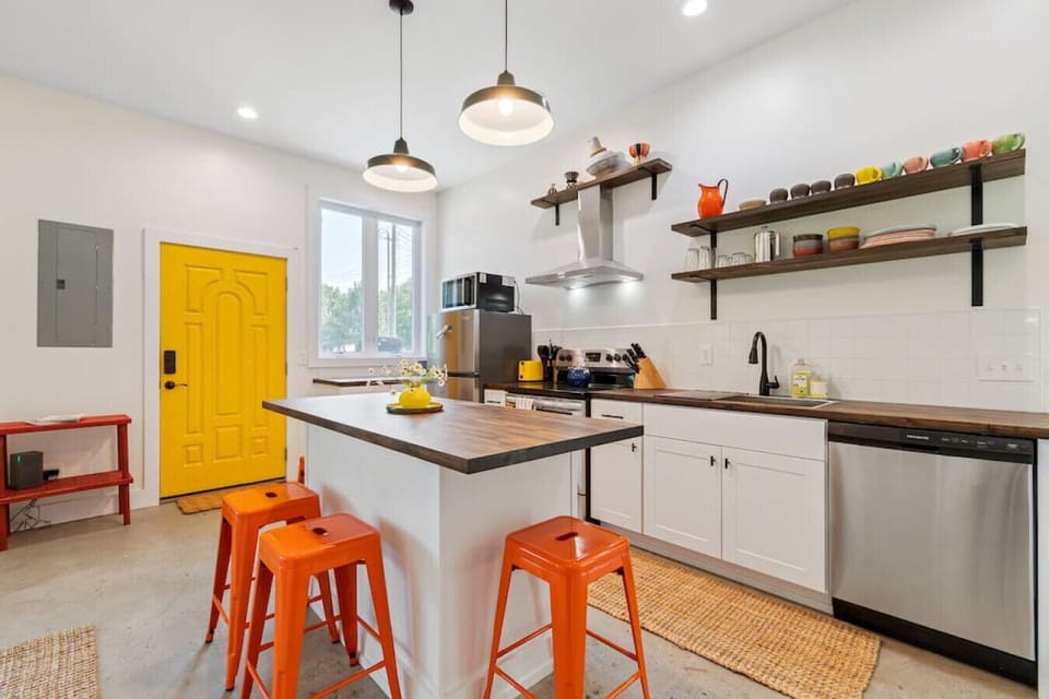 Fully stocked & well-lit kitchen for all your cooking needs.