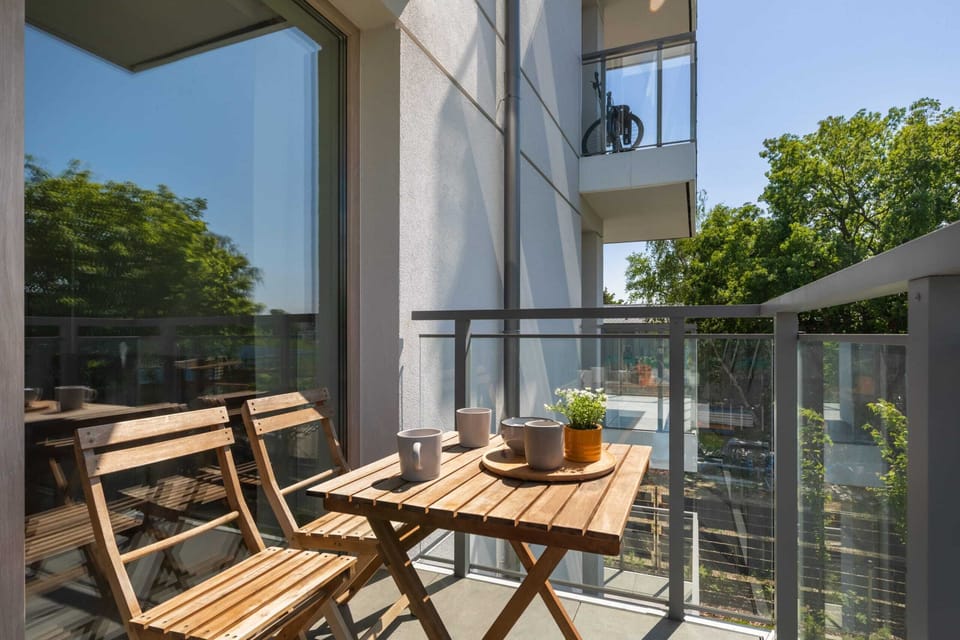Private balcony with garden furniture.