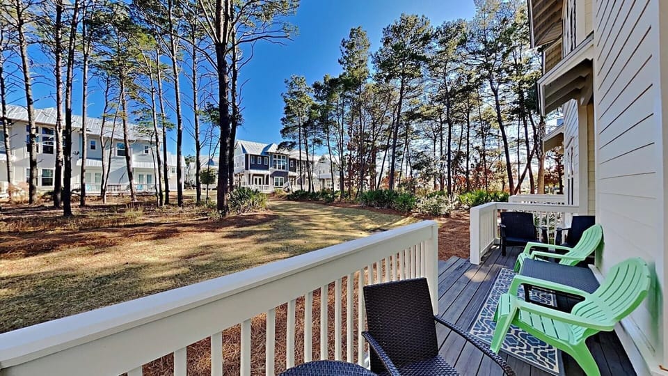 Outdoor living area with steps to the green space