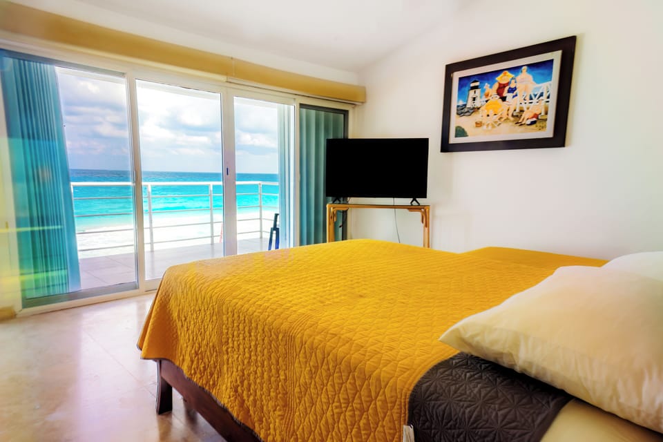 Wake up to endless turquoise from the master bedroom