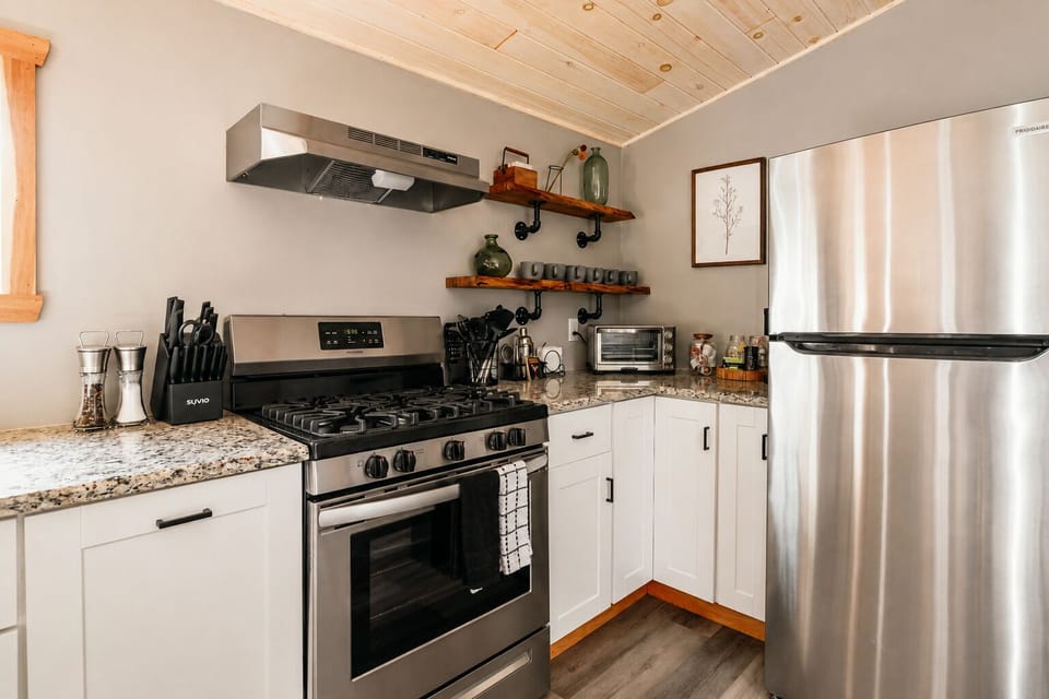 Season your food from the shakers on the counter and pop leftovers in the toaster oven to reheat. The stovetop has room for a few pots going if you're cooking a bigger meal.