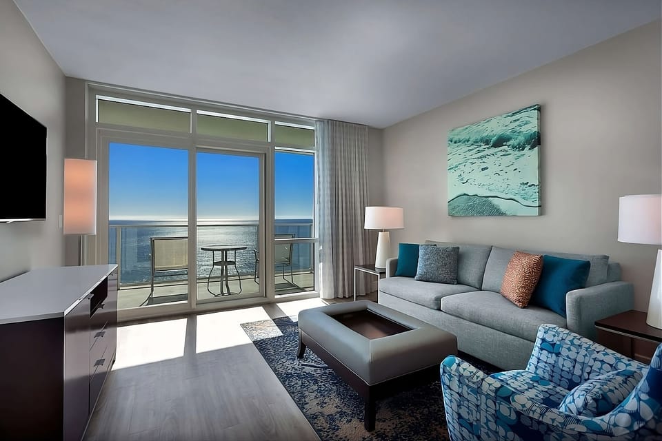 Wake up to ocean sunsets from your private balcony lounge.