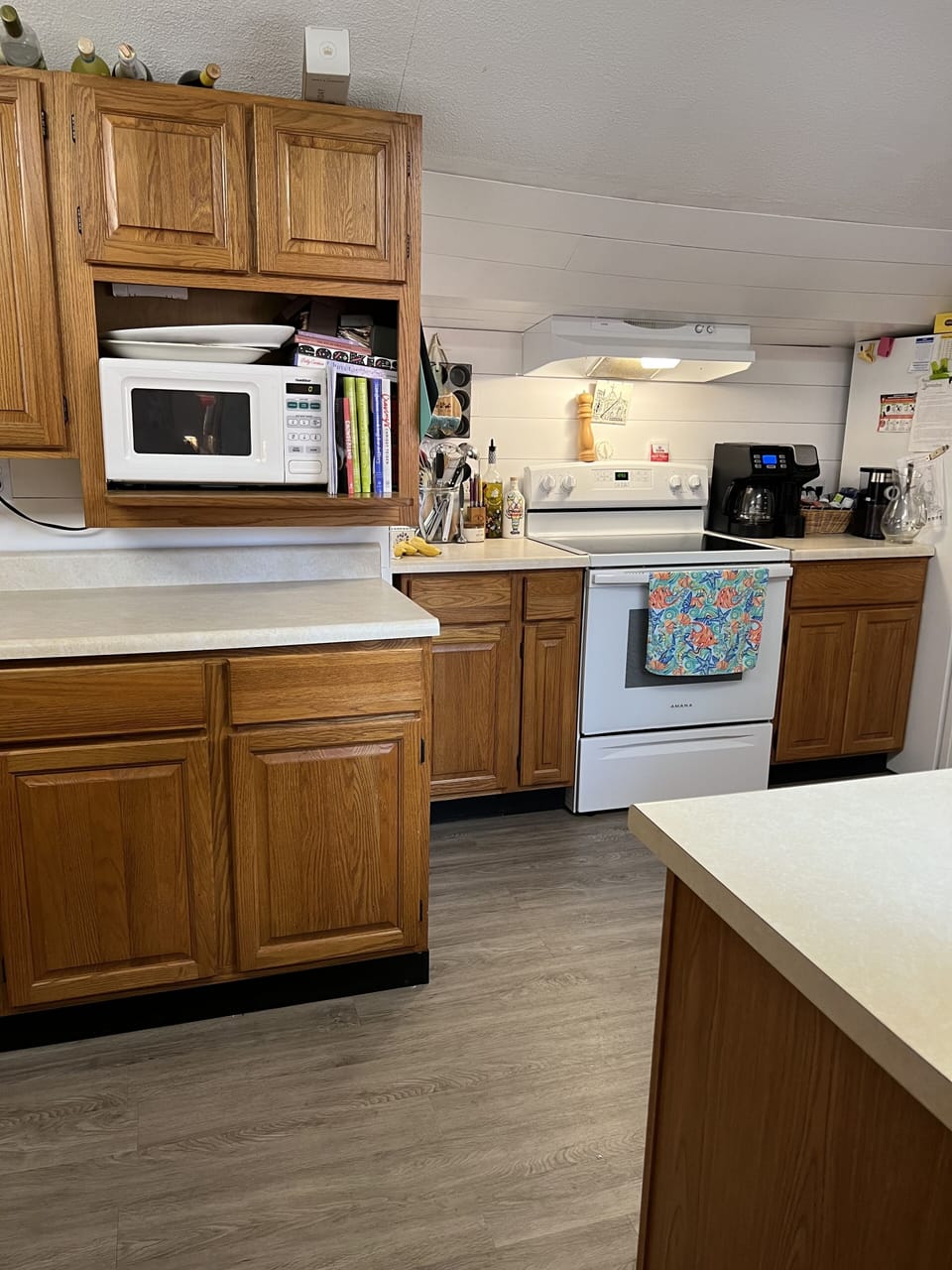 kitchen with new electric stove, microwave, dishwasher, garbage disposal, etc 