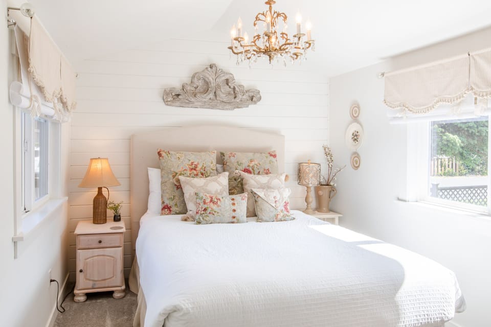 Master bedroom with gently vaulted ceiling, quality queen mattress and linens