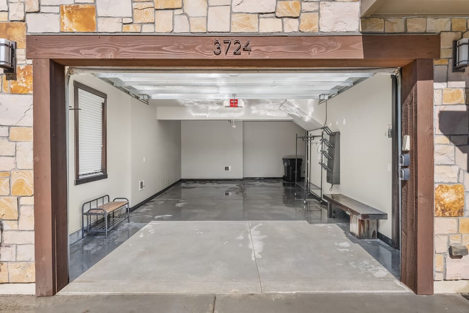 - Spacious garage with polished floor and stone exterior entry  
- Perfect for parking or storing gear for mountain adventures  
- Convenient access right from the driveway to the home