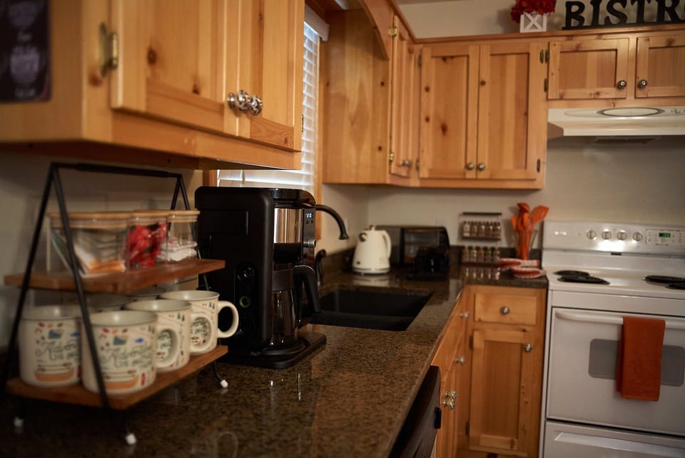 Fully equipped Kitchen, dishwasher, electric stove, full size refrigerator.