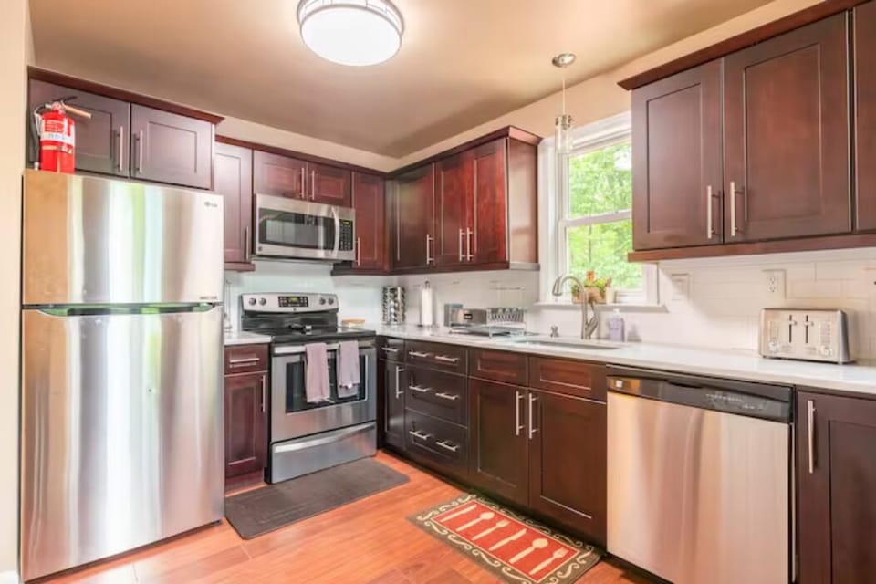 Kitchen with Refrigerator,  Electric stove and oven, dish washer and microwave 