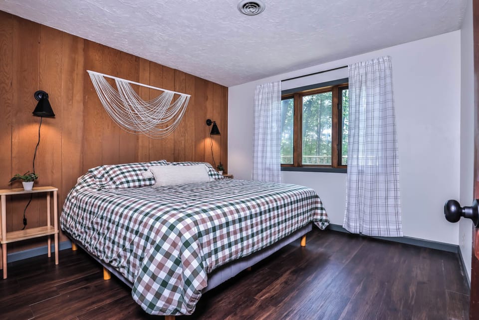 Main floor primary bedroom with King bed.