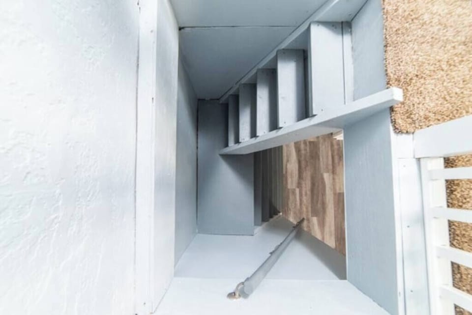 Ladder steps to loft *Very steep custom built for the space