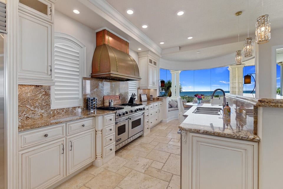 Chef’s kitchen with premium appliances and ocean views