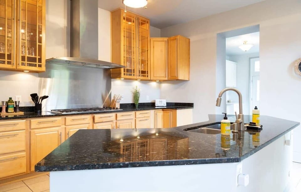 Modern kitchen layout with an open feel, making it easy to cook, gather, and stay connected. #TravelTogether