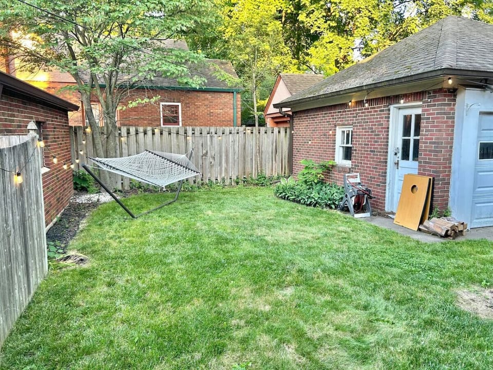 Backyard - Grill, fire pit, hammock, cornhole, dining table