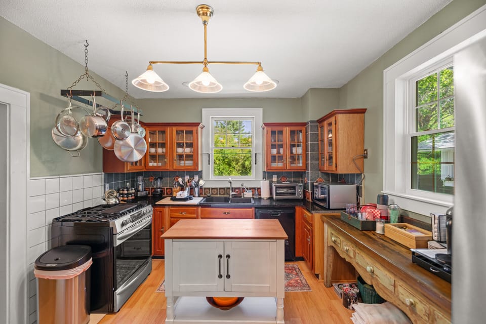 Fully equipped kitchen with modern amenities 