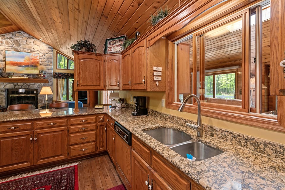 Plenty of counter space and a view into the sun room above the sink