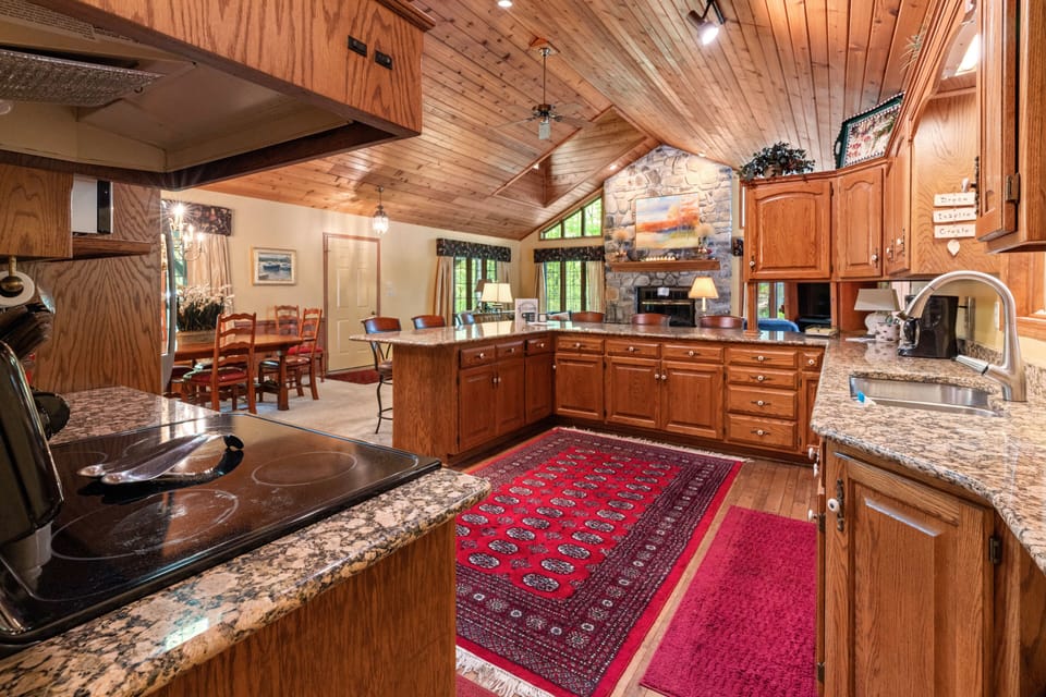Large kitchen is fully stocked for guests to prepare meals