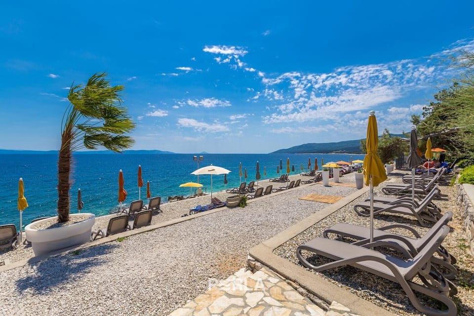 Rabac beach in the area, crystal clear sea