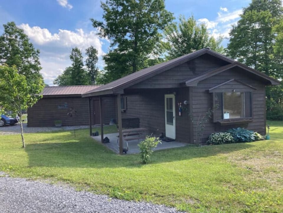 Front/side of cabin- park in driveway on left or in front of the window on right