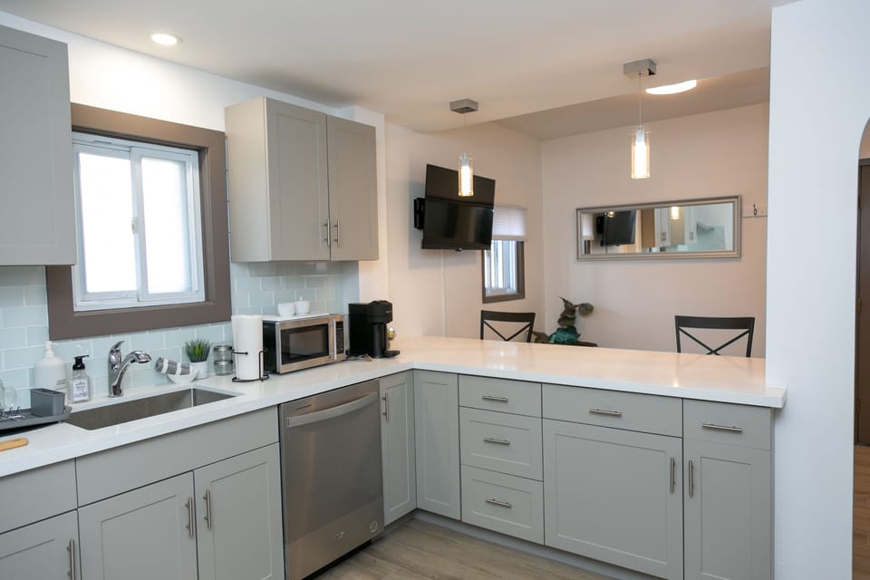 Bright open concept unit with space to hang out with friends