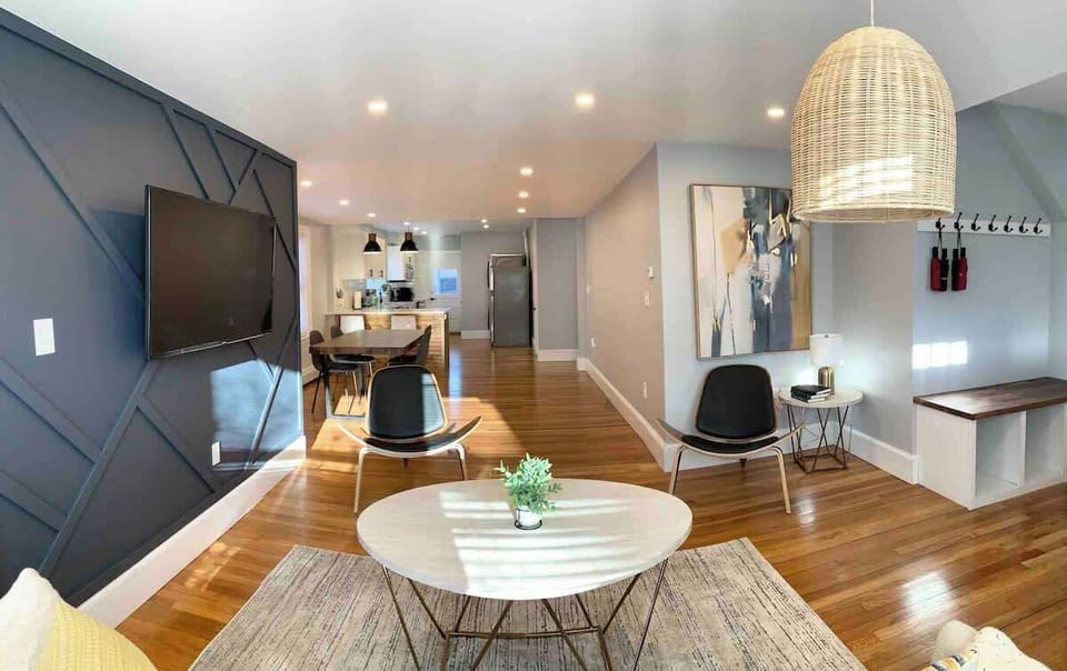 Living Room: View towards the dining room and kitchen. Wide area to walk and move. 