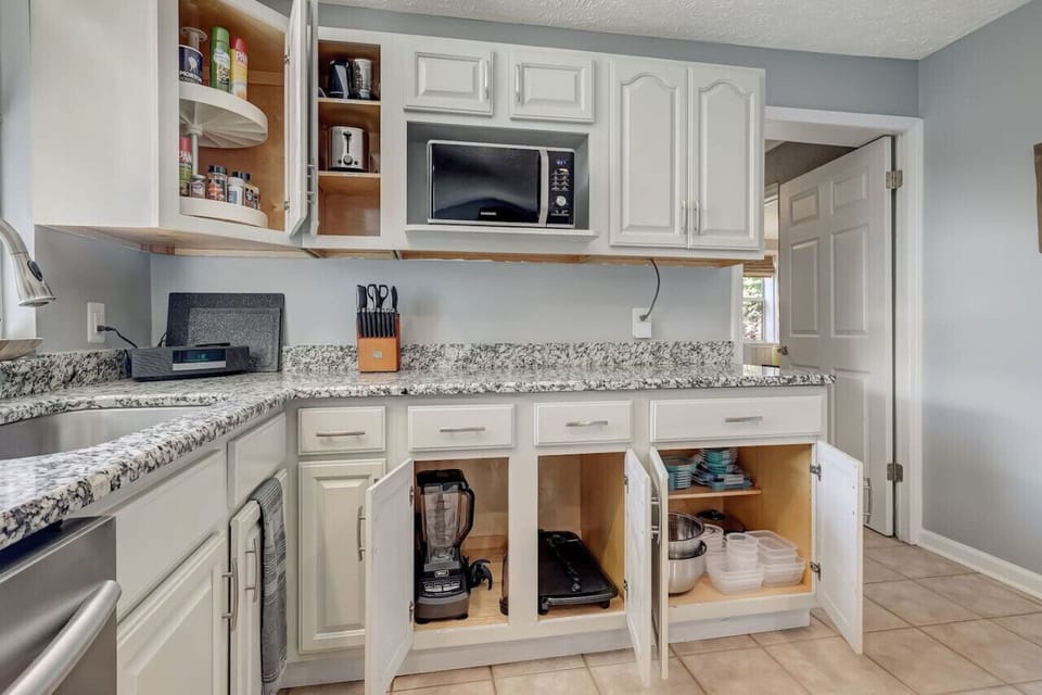 Our kitchen comes fully stocked with most everything you`d need to cook and prepare a meal or  construct your favorite frozen cocktails.